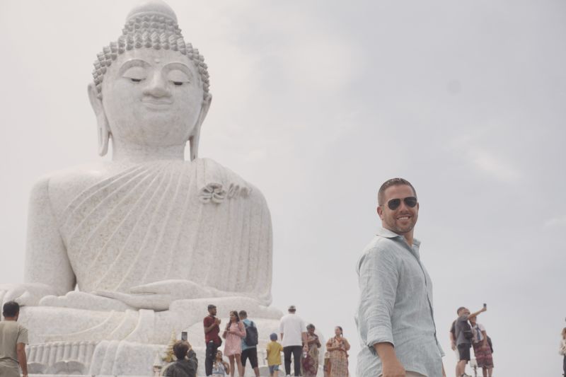 John Visiting the Big Buddha Statue in Thailand