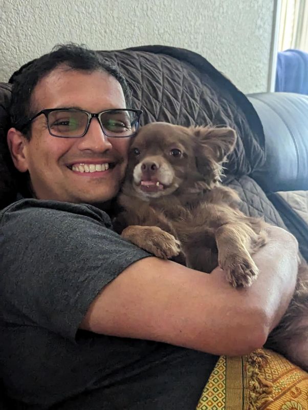 Pratik Showing Some Love to Our Dog Bigsby 