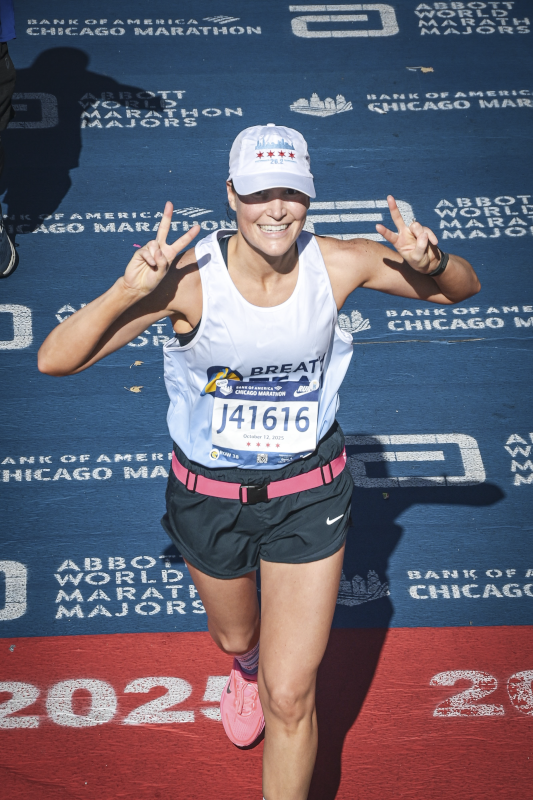 Megan Finishing a Marathon