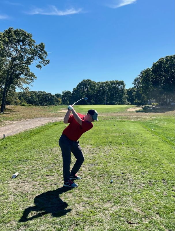 Steve Golfing Outside