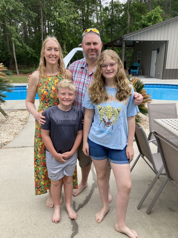 With our Niece and Nephew by the Pool 
